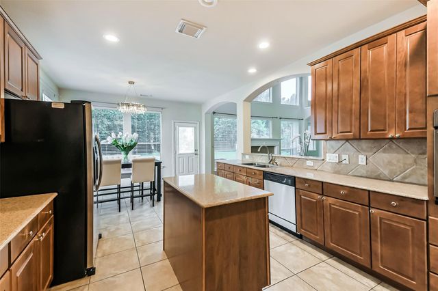 8718 Rolling Rapids Road, Humble, TX 77346