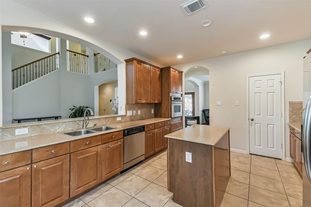 8718 Rolling Rapids Road, Humble, TX 77346