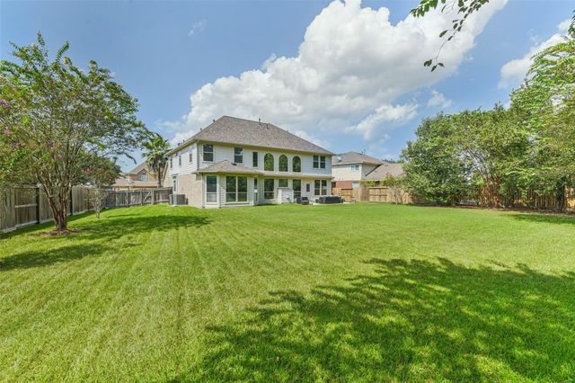 8718 Rolling Rapids Road, Humble, TX 77346