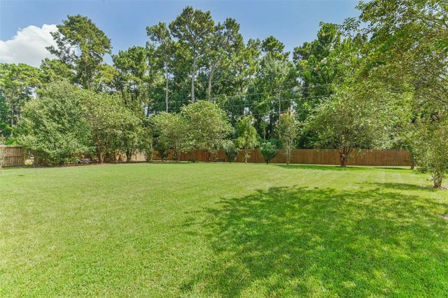 8718 Rolling Rapids Road, Humble, TX 77346