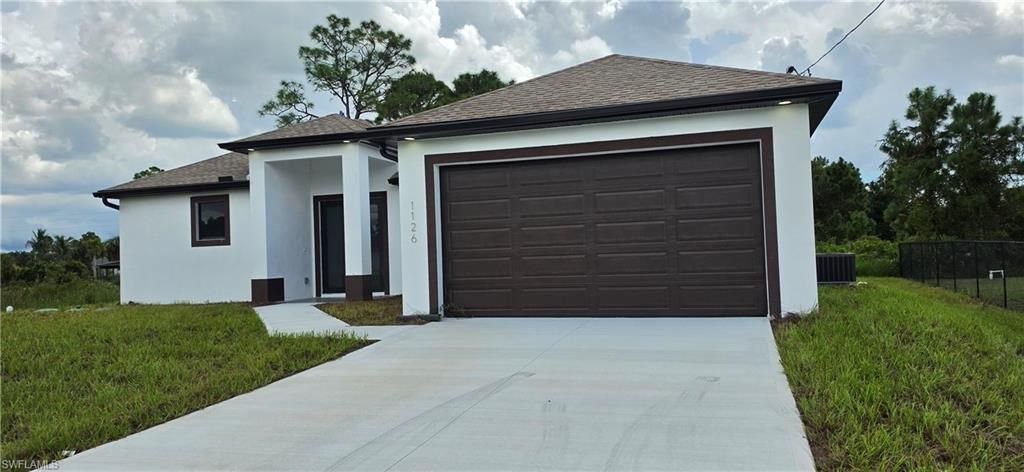 1126 Milwaukee BLVD, LEHIGH ACRES, FL 33974 — photo 2