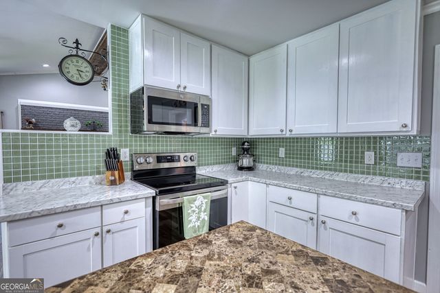 1568 Ridgewood Drive SW, Lilburn, GA 30047