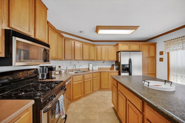 313 Market Avenue NW, Mitchellville, IA 50169