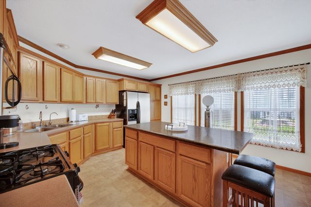 313 Market Avenue NW, Mitchellville, IA 50169