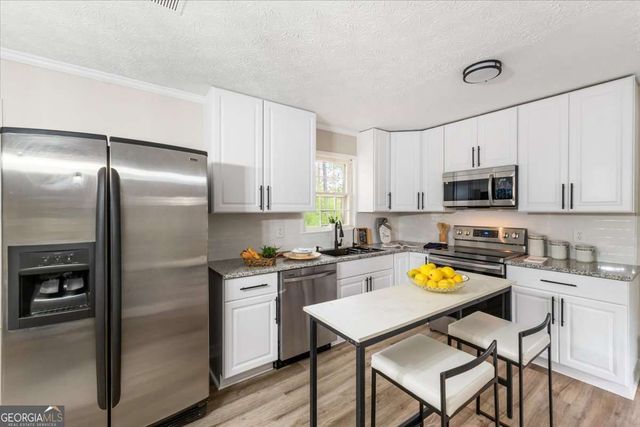 712 Copper Trace Way, Woodstock, GA 30189