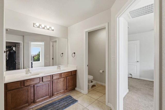 153 El Camino Loop NW, Rio Rancho, NM 87144