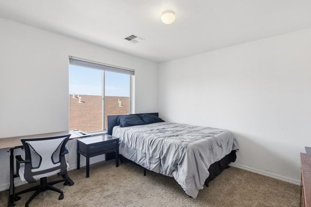 153 El Camino Loop NW, Rio Rancho, NM 87144