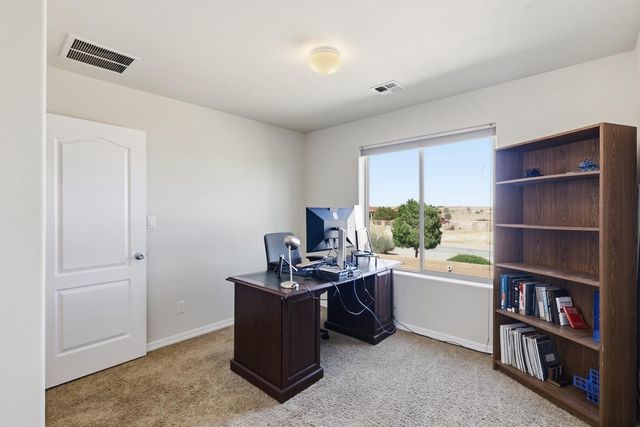 153 El Camino Loop NW, Rio Rancho, NM 87144