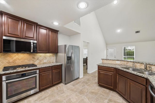 7015 Riata Hills Lane, Spring, TX 77379