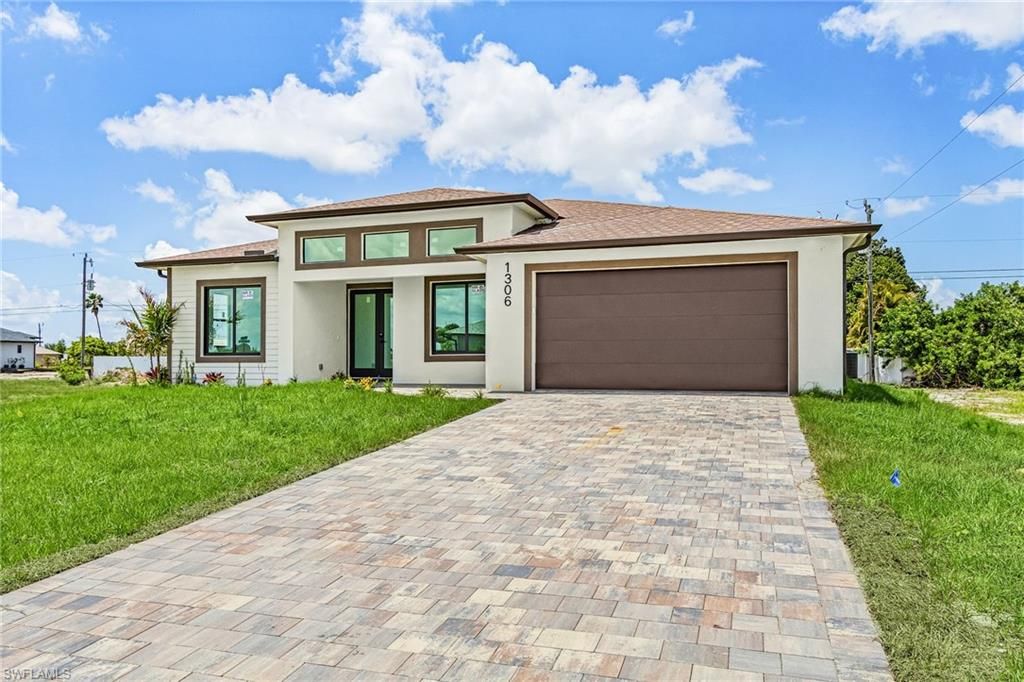 1306 NE 3rd AVE, CAPE CORAL, FL 33909 — photo 3