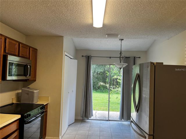 12723 WOOD TRAIL BOULEVARD, Tampa, FL 33625