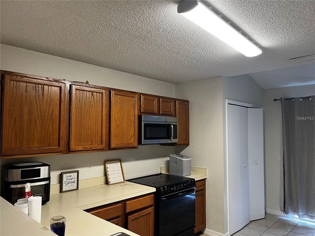 12723 WOOD TRAIL BOULEVARD, Tampa, FL 33625