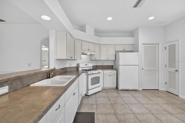 27106 GREENFLY ORCHID LANE, Leesburg, FL 34748