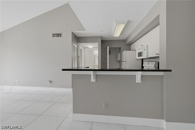 1265 Wildwood Lakes BLVD 207, Naples, FL 34104