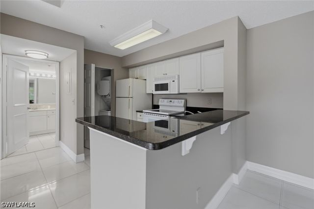 1265 Wildwood Lakes BLVD 207, Naples, FL 34104