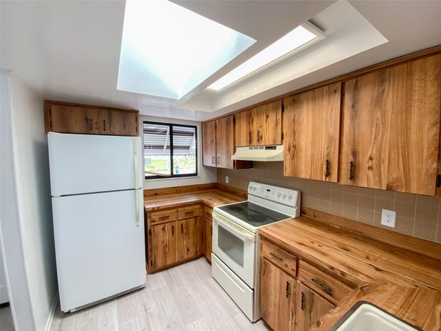 2242 PINEWOOD VILLAS DRIVE, Holiday, FL 34691