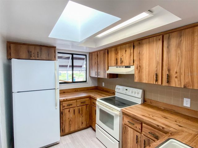 2242 PINEWOOD VILLAS DRIVE, Holiday, FL 34691