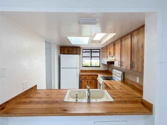 2242 PINEWOOD VILLAS DRIVE, Holiday, FL 34691