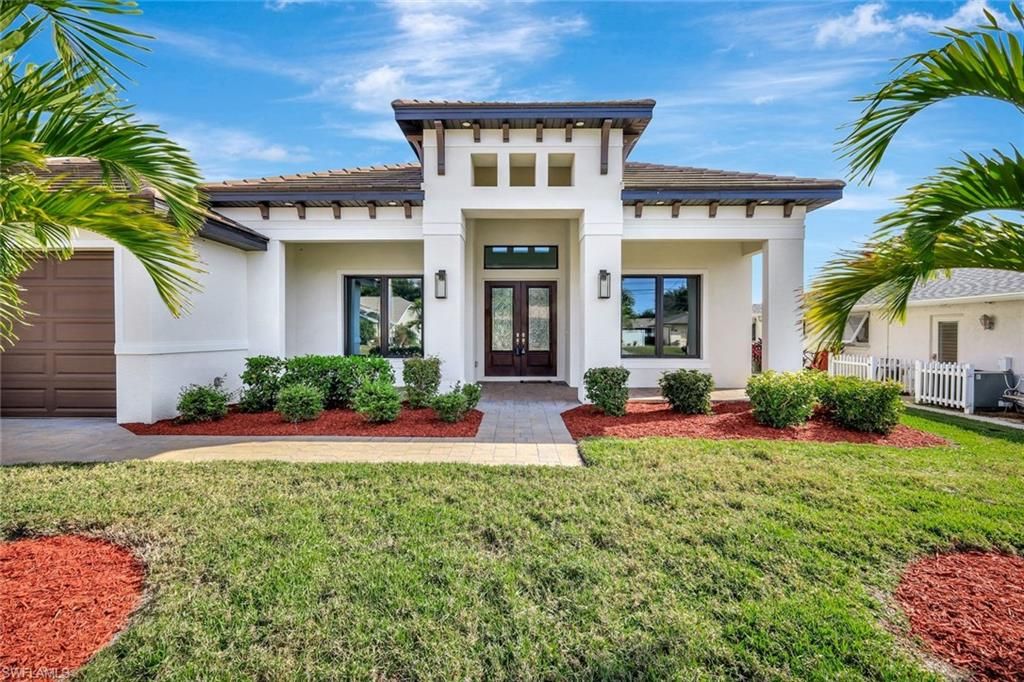 Image 2 of property listing at 1205 SE 20th CT, Cape Coral, FL 33990