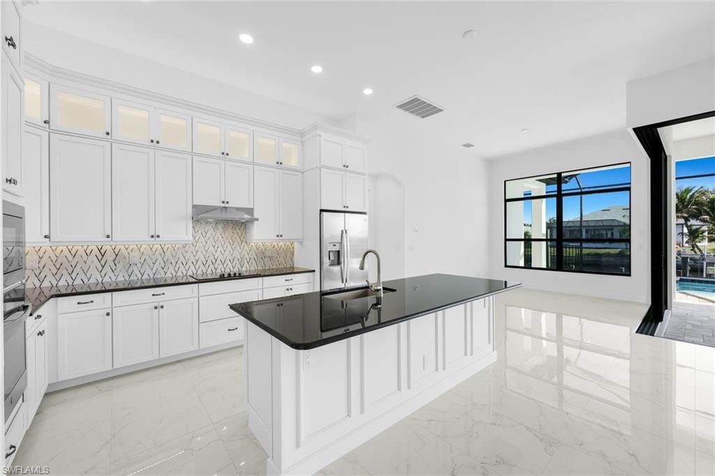 Image 25 of property listing at 1205 SE 20th CT, Cape Coral, FL 33990