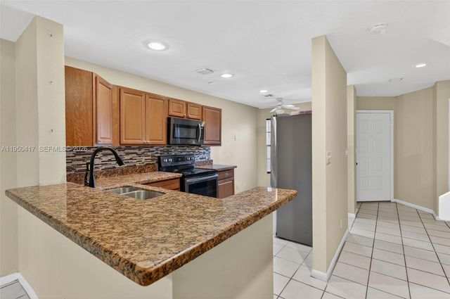 7033 Woodmont Way, Tamarac, FL 33321