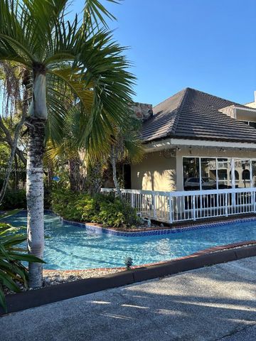 7703 Camino Real A-207, Miami, FL 33143