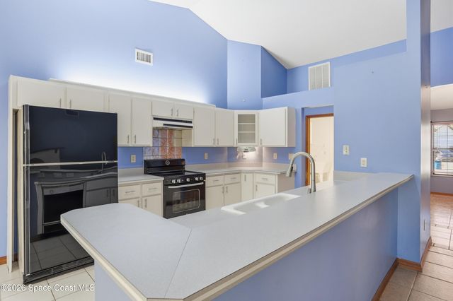 1031 Peacock Avenue NE, Palm Bay, FL 32907