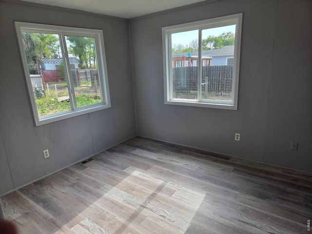 101 Larch Dr, Log Lane Village, CO 80705