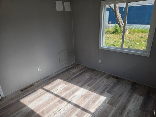 101 Larch Dr, Log Lane Village, CO 80705