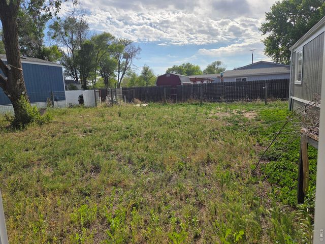 101 Larch Dr, Log Lane Village, CO 80705