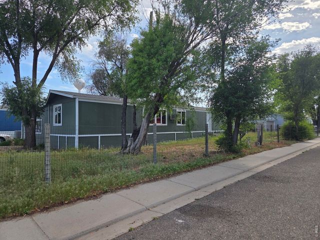 101 Larch Dr, Log Lane Village, CO 80705