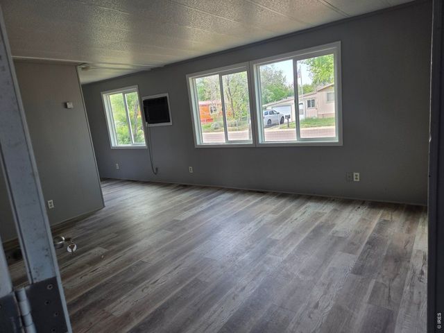 101 Larch Dr, Log Lane Village, CO 80705