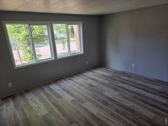 101 Larch Dr, Log Lane Village, CO 80705