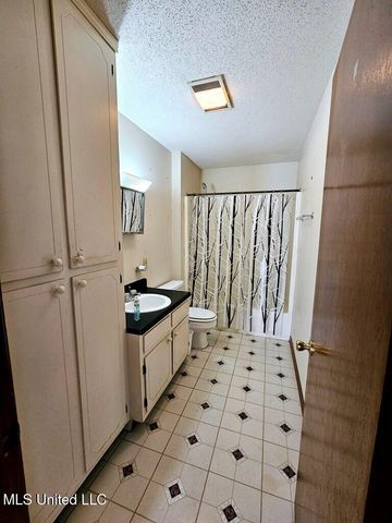 313 S Woodard Street, Poplarville, MS 39470