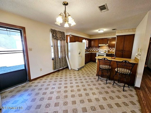 313 S Woodard Street, Poplarville, MS 39470