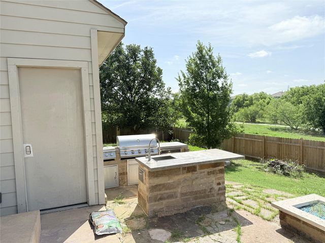 406 Dragon Ridge RD, Buda, TX 78610