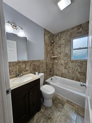 1571 Powers Avenue, East Meadow, NY 11554