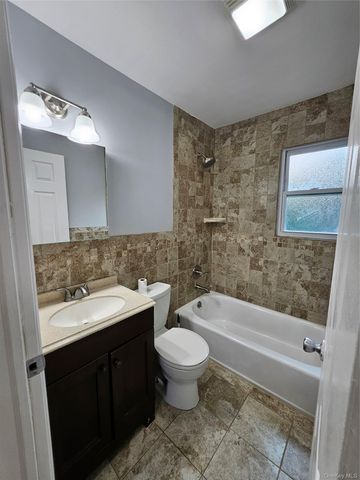 1571 Powers Avenue, East Meadow, NY 11554