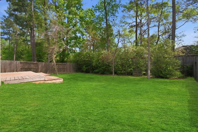 124 Cobble Medley Court, Conroe, TX 77318