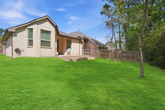 124 Cobble Medley Court, Conroe, TX 77318