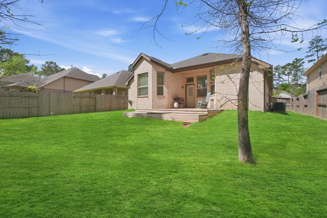 124 Cobble Medley Court, Conroe, TX 77318