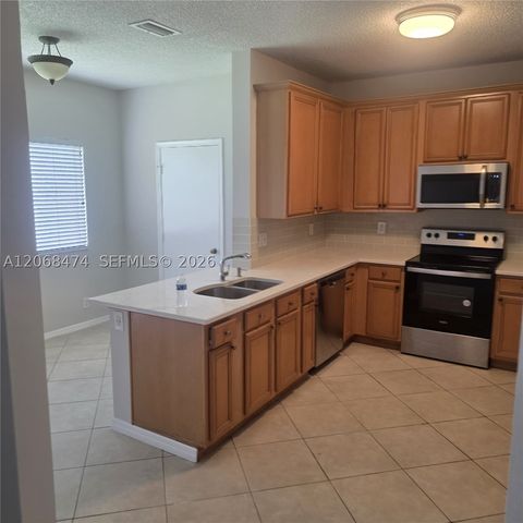 4730 Lago Vista Dr, Coconut Creek, FL 33073