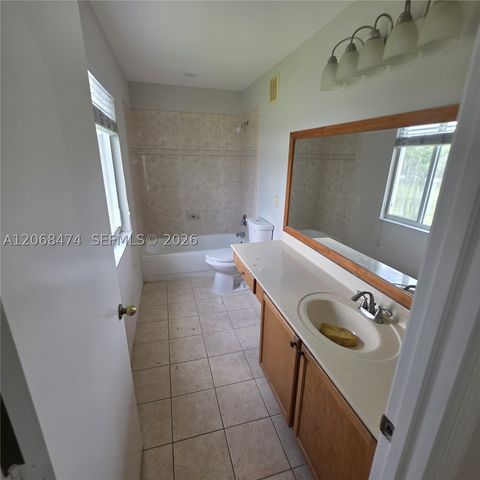 4730 Lago Vista Dr, Coconut Creek, FL 33073