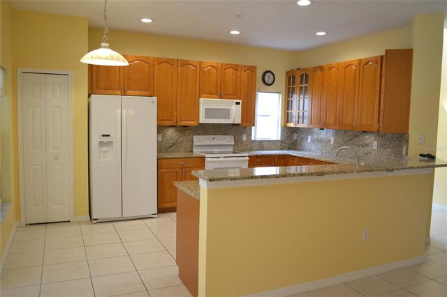 11117 KAPOK GRAND CIRCLE, Madeira Beach, FL 33708