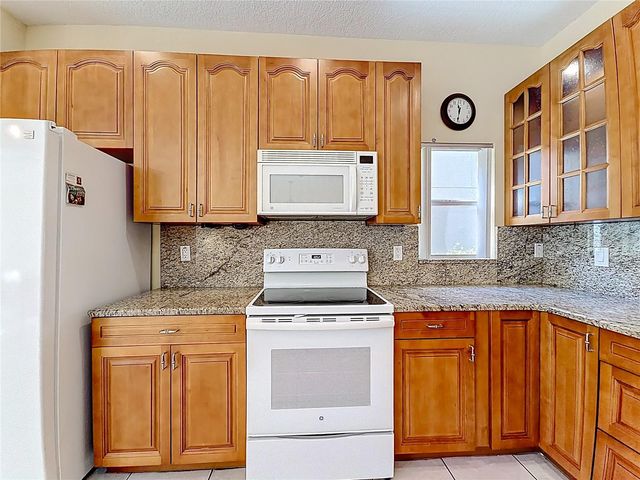 11117 KAPOK GRAND CIRCLE, Madeira Beach, FL 33708