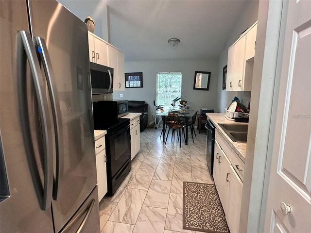1021 EMBRUN COURT, Kissimmee, FL 34759