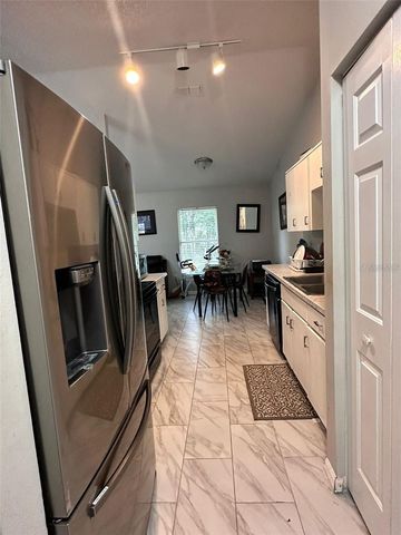 1021 EMBRUN COURT, Kissimmee, FL 34759