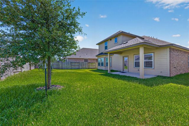 7046 Lauren Oak Drive, Conroe, TX 77304