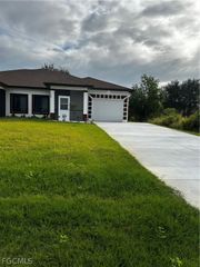 719 Harry AVE S, Lehigh Acres, FL 33973