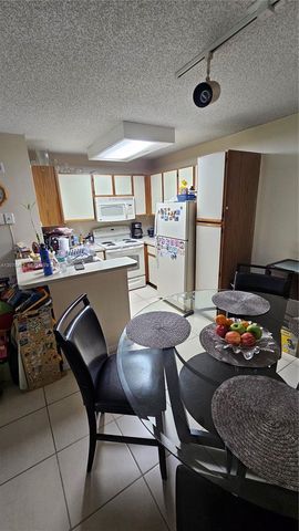 931 Lyons Road 4102, Coconut Creek, FL 33063
